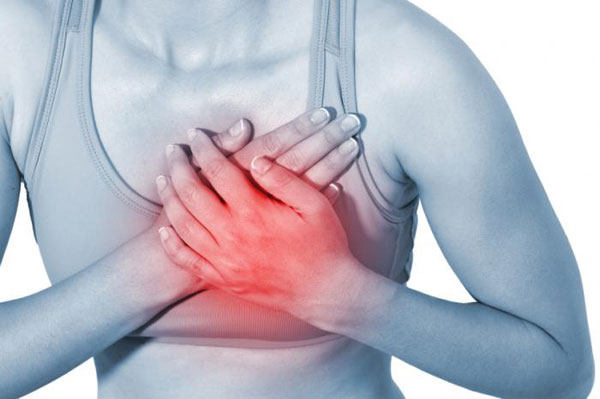 woman-clutches-heart-with-pain-radiating-from-it.jpg